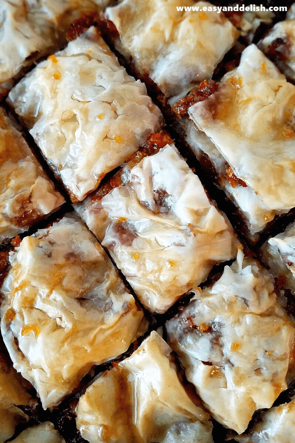 sliced walnut baklava in a sheet pan