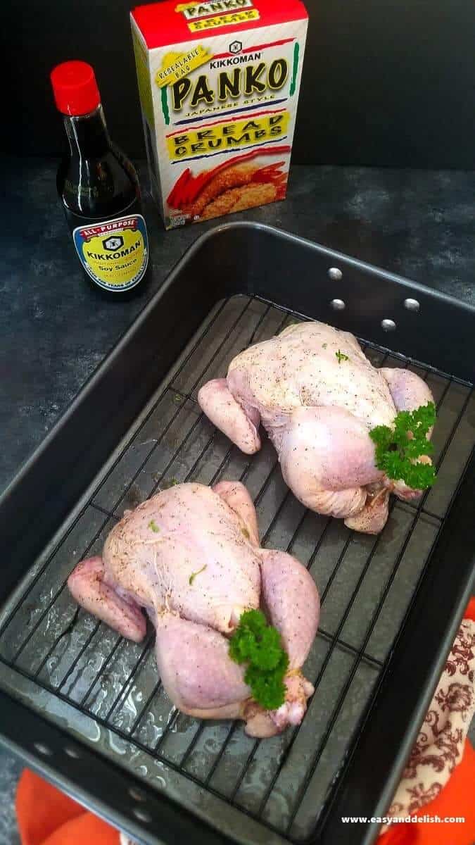 ttwo cornish hens onto a roasting pan 