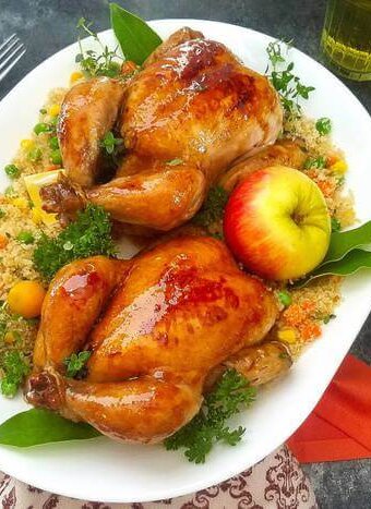 A plate of Tanksgiving food on a table