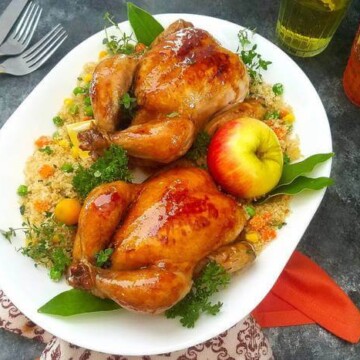 A plate of Tanksgiving food on a table