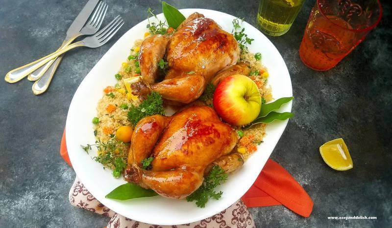 apple glaze cornish hen served in a platter with toasted herb dressing 
