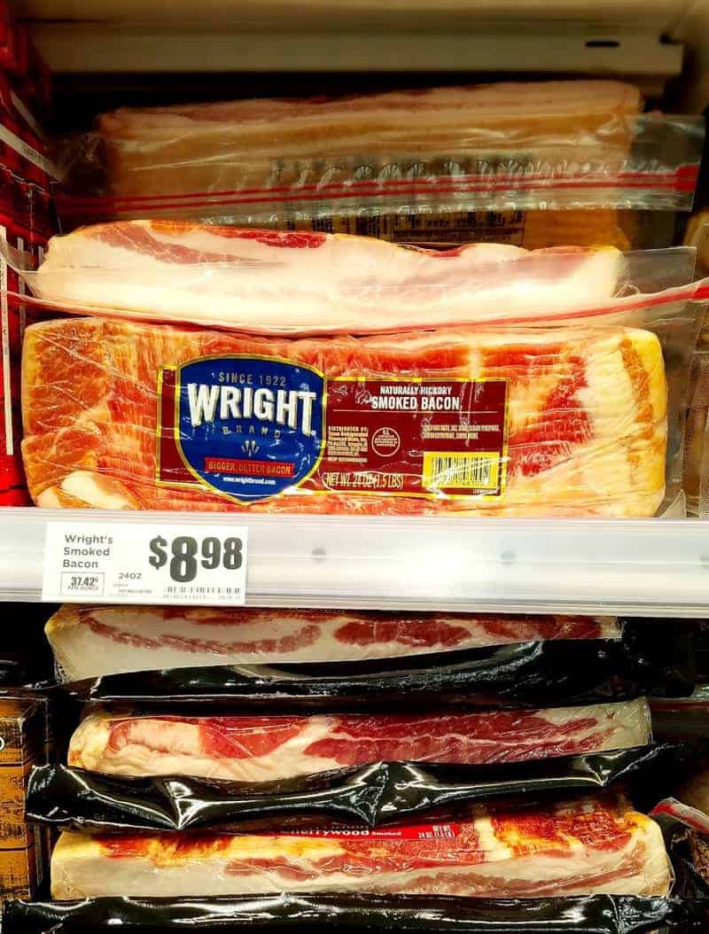 aisle of a supermarket showing where to find bacon (collage)