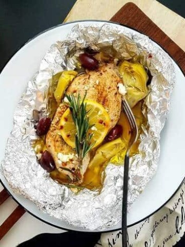 A plate of fish and veggies