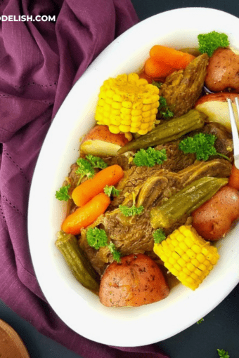 instant pot beef short ribs, rib pot roast style in a tray with veggies