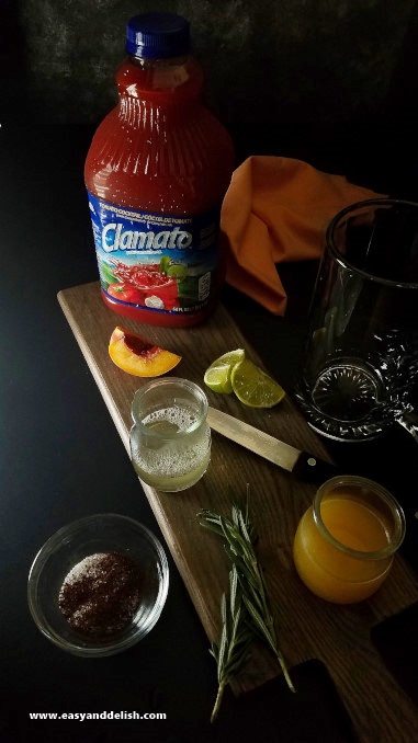 Display of ingredients of peach rosemary michelada