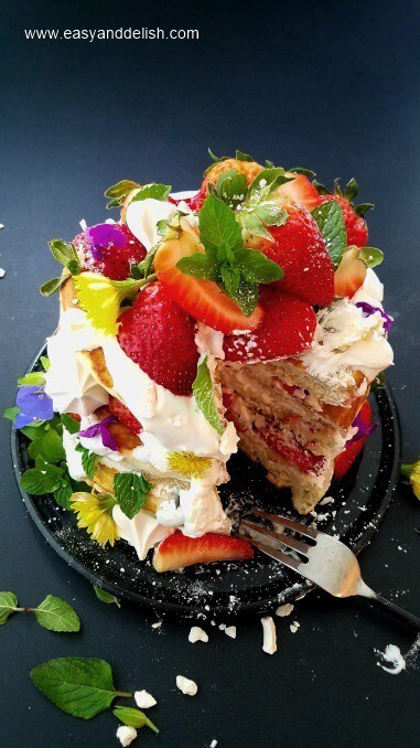 Stack of Strawberry shortcake pancakes partially sliced