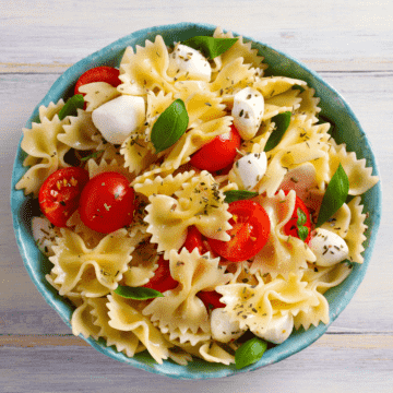 close up of caprese pasta salad with balsamic vinaigrette dressing..