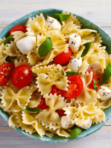close up of caprese pasta salad with balsamic vinaigrette dressing..