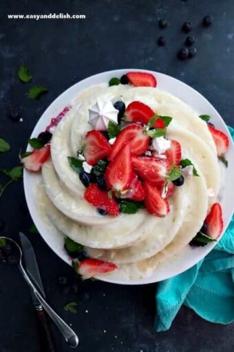 tapioca cake topped with berries in a plate