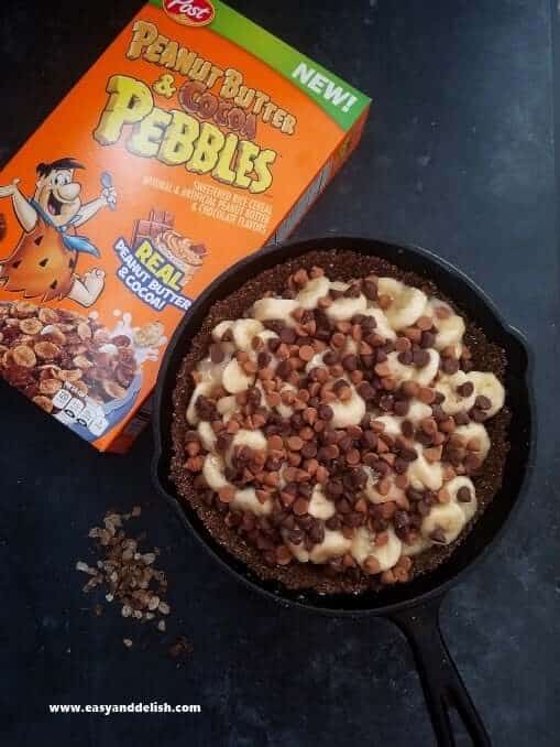 Filling of the peanut butter chocolate banana crumble pie in a skillet