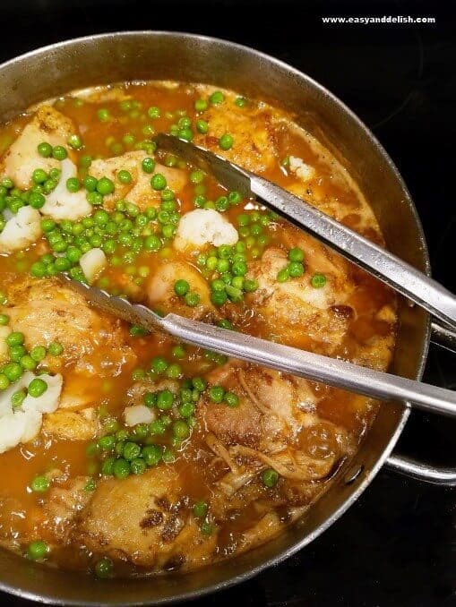 close up of a pan with stew being cooked