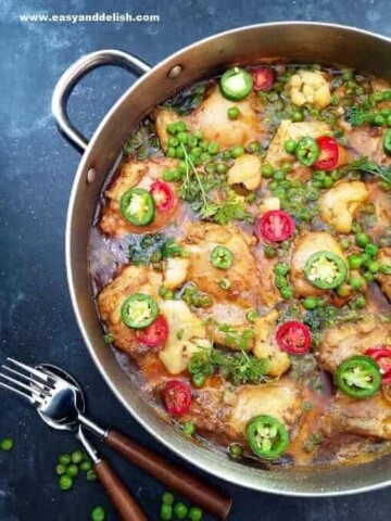 a pan with coconut chicken curry