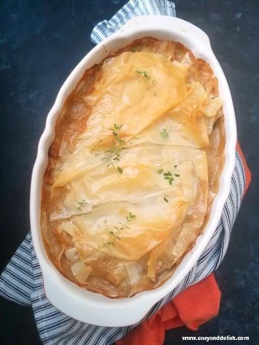 Mediterranean chicken pot pie in a baking pan 