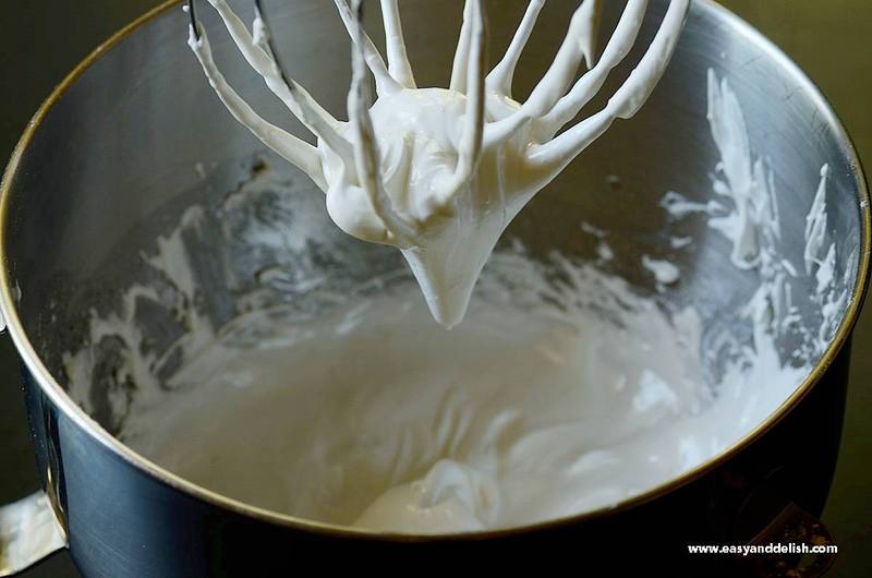 meringue in a mixer bowl showing stiff peak