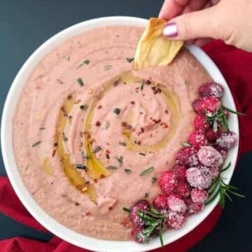 A bowl of cranberry hummus dip