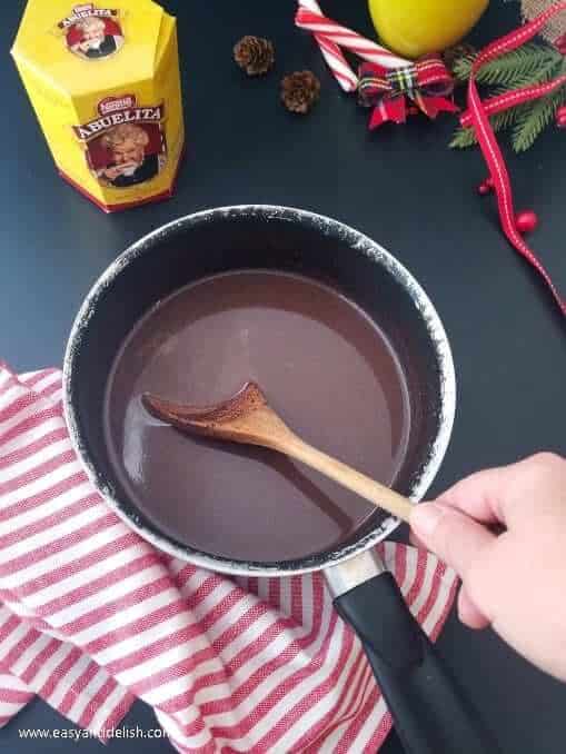 cooking hot chocolate to serve with gingerbread cookie bars