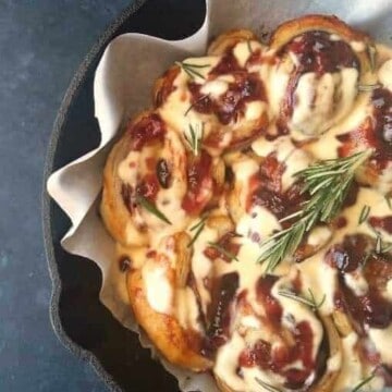 Monte Cristo sandwich rolls in a skillet