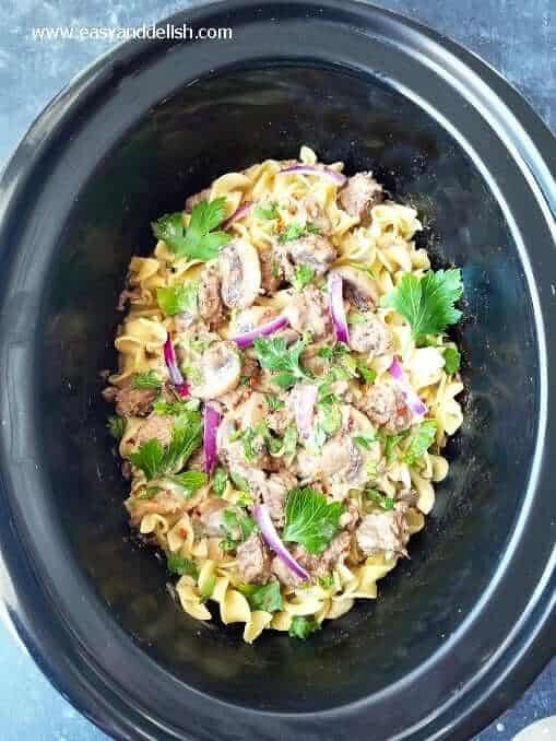 This Slow Cooker Beef Stroganoff is the easy, healthy version of the classic, making the perfect family meal for busy weekdays. Serve over (gluten-free) egg noodles, or spaghetti squash slow cooker beef stroganoff after cooking