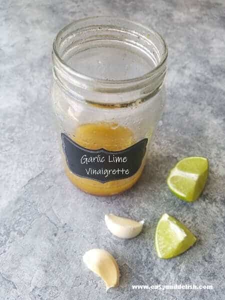 garlic lime vinaigrette in a jar for homemade coleslaw