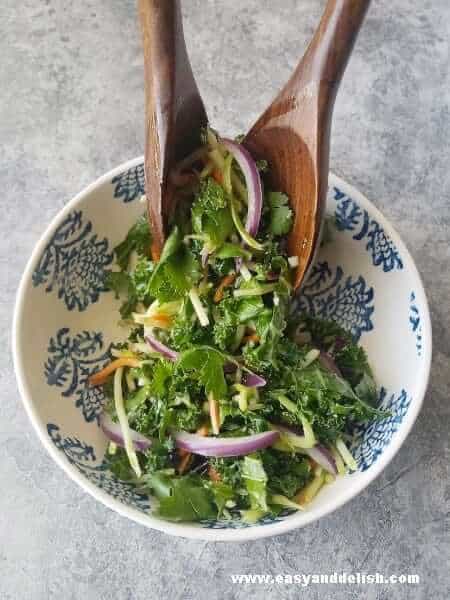 tossing homemade coleslaw