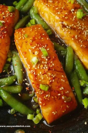 close up of teriyaki salmon with sugar snap peas