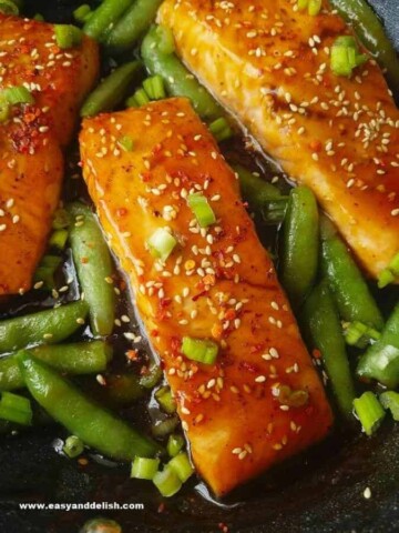 close up of teriyaki salmon with sugar snap peas