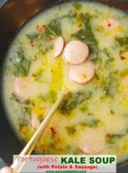 Closeup image of Portuguese kale soup with potatoes and sausage.