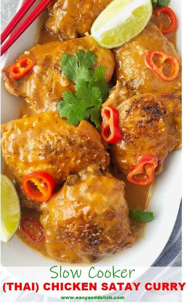 Close up iamge of chicken satay curry in a platter with garnishings