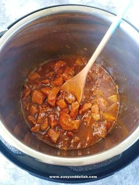 sweet and sour pork cooking in the pressure cooker