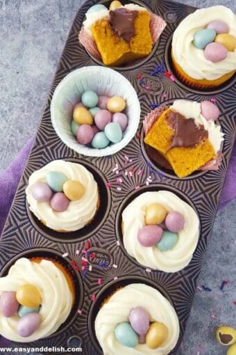 Brazilian carrot cupcakes decorated for Easter in a muffin tin