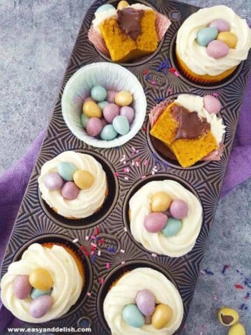 Brazilian carrot cupcakes decorated for Easter in a muffin tin