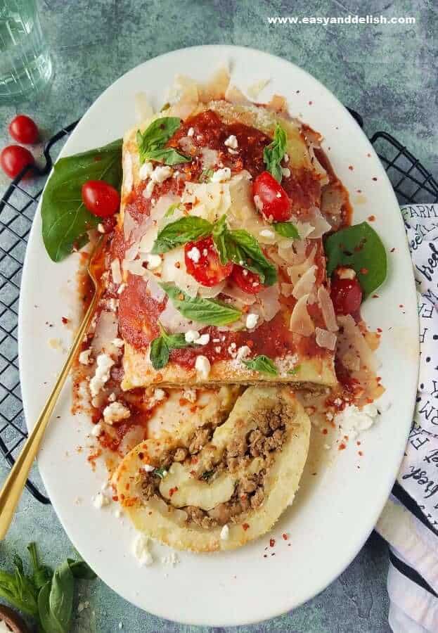 close up of potato roulade sliced in a platter