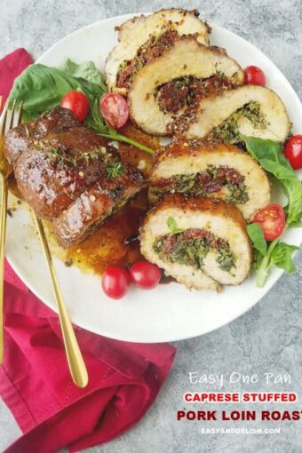 A plate with stuffed pork loin sliced with veggies