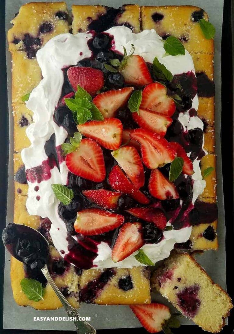 berry cake topped with fresh berries