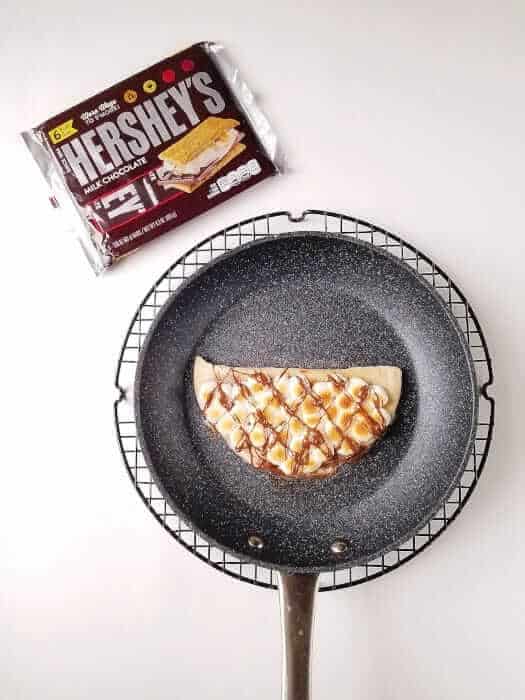chocolate and marshmallow quesadilla in a skillet.