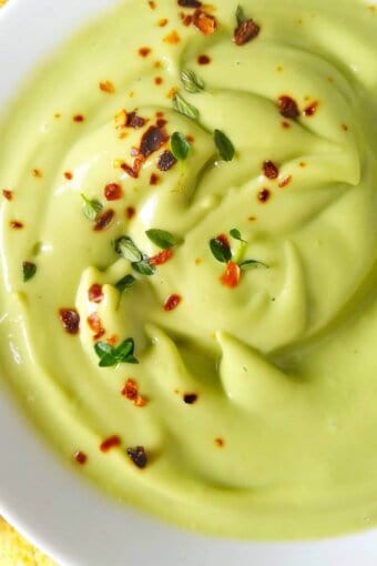 A close up of creamy avocado dip