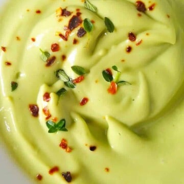 A close up of creamy avocado dip