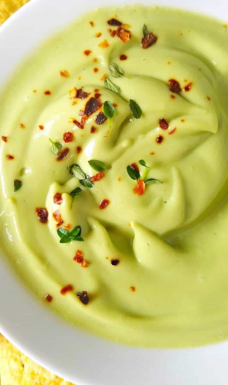 A close up of creamy avocado dip