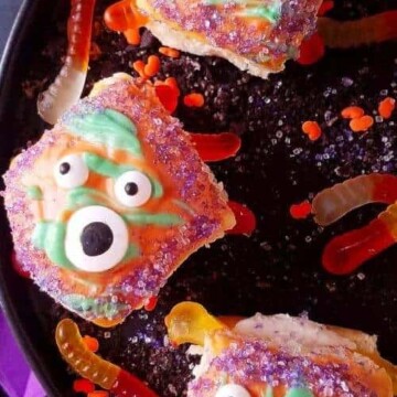 A close up of pumpkin bread rolls decorated for Halloween