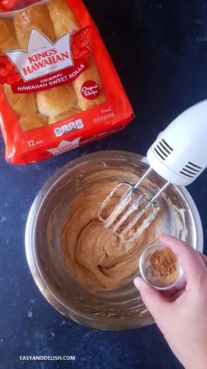 beating pumpkin cream cheese filling with a mixer