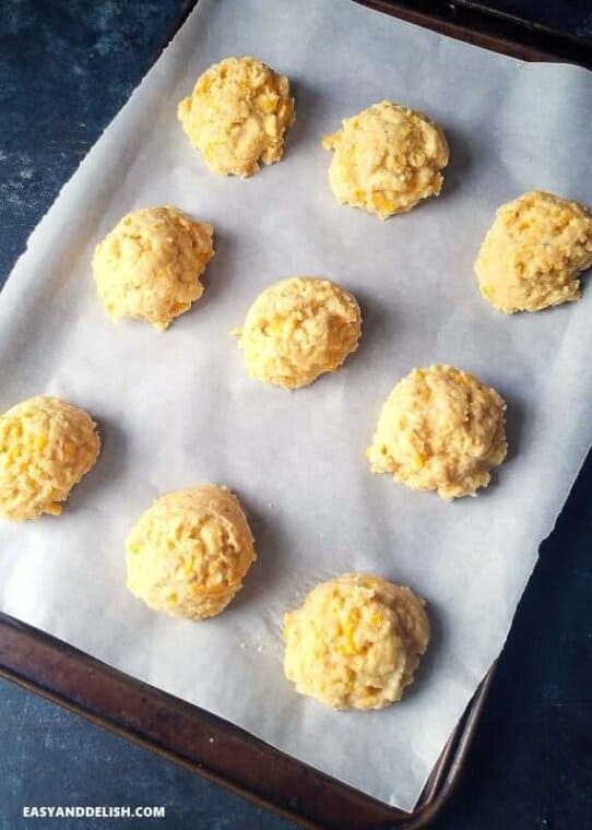 Paleo biscuits scooped onto a bakinh sheet before being abked