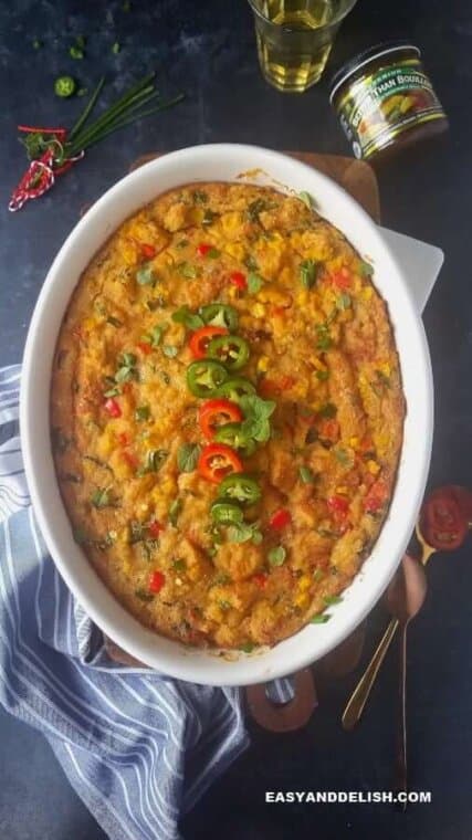 Mexican cornbread casserole with spoons on the side