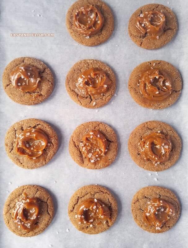 baked goods topped with salted dulce de leche on a baking sheet. 