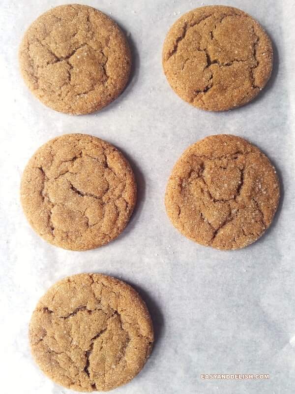 Molasses cinnamon cookies on a baking sheet!