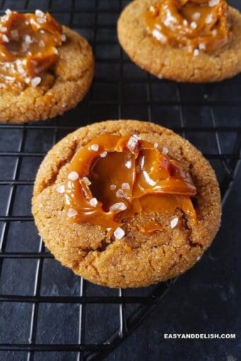 Close up of dulce de leche cinnamon cookies over a rack