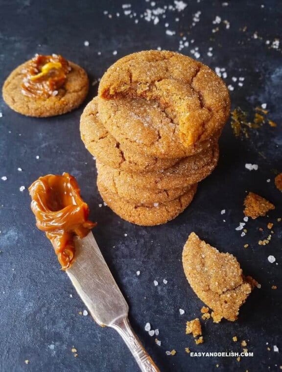 Soft and chewy molasses cookies piled up. 