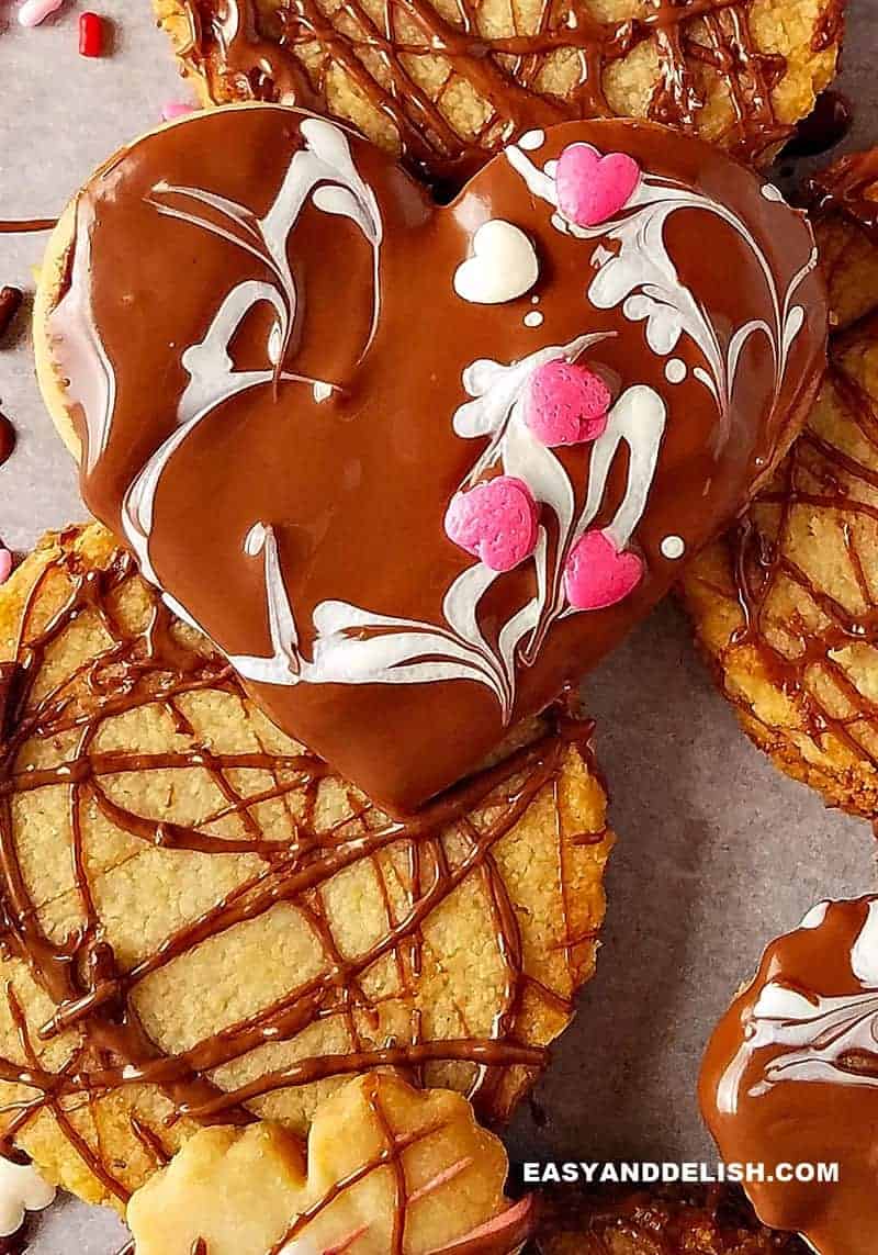 close up image of keto shotbread cookies with a heart and also round shape cookies