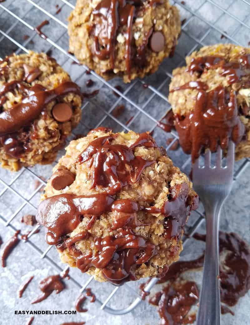 oatmeal chocolate chip cookies drizzled with melted chocolate
