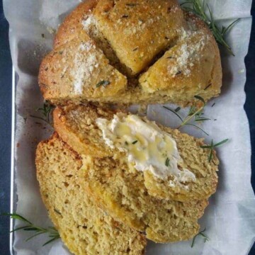 cropped-No-Yeast-Bread-or-Crockpot-bread-part-whole-and-part-sliced.jpg