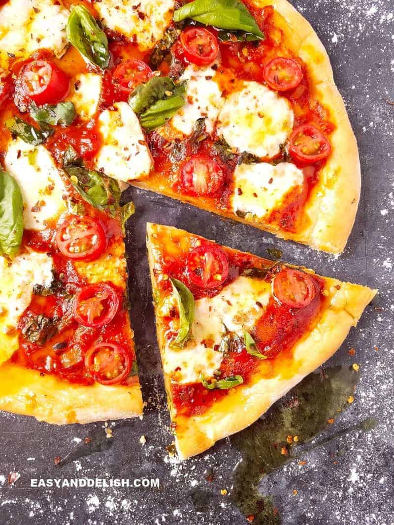 sliced margherita pizza as one of our low-calorie dinner that has 100 calories for weight loss.
